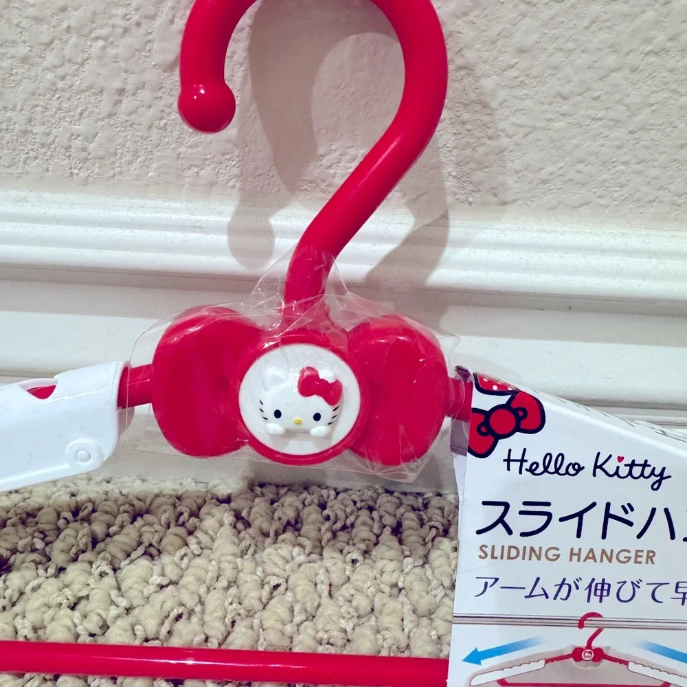 Hello Kitty Sliding Hangers - Set of 7. NEW with TAG